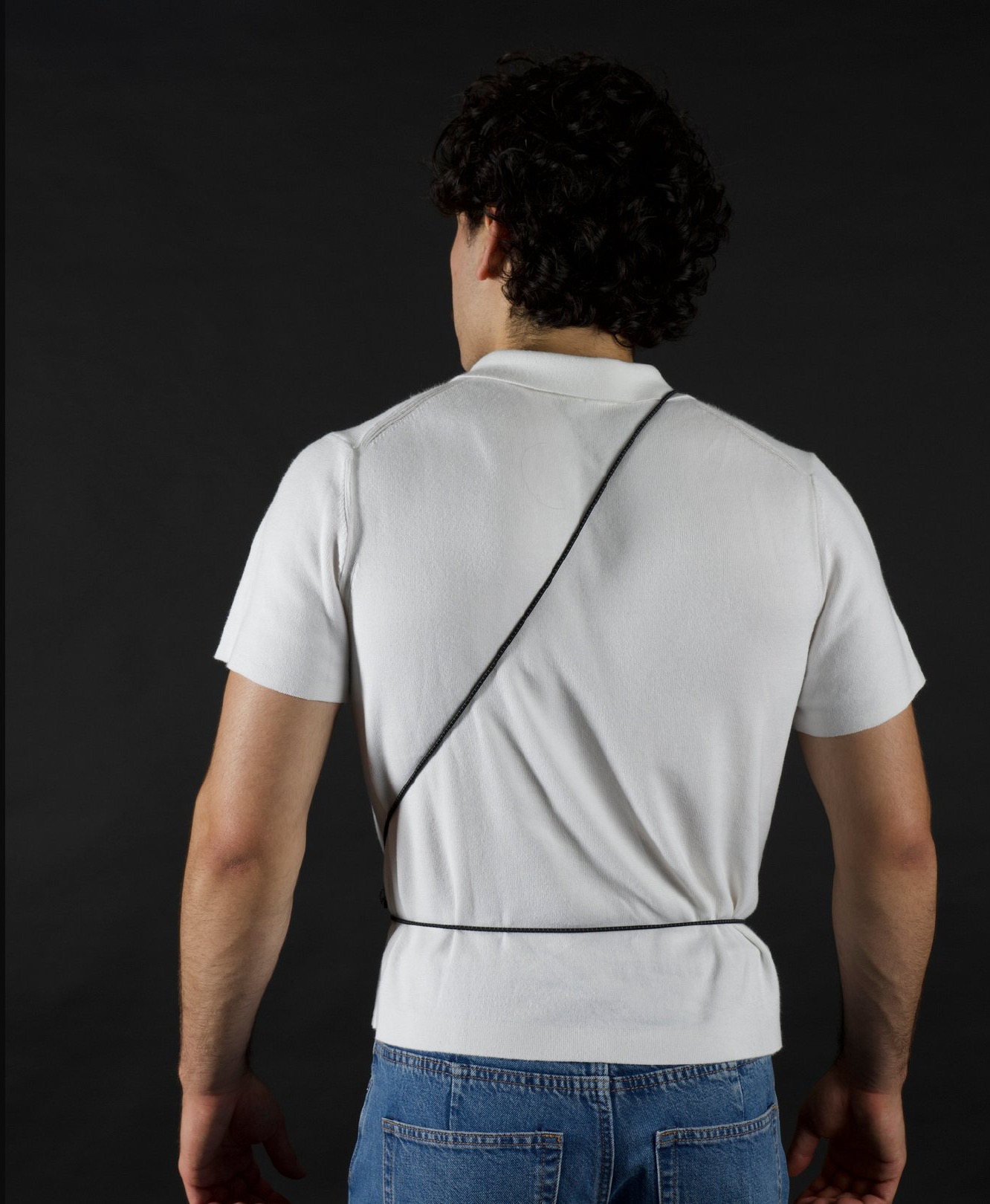 Kangoo — strap routing seen from the back